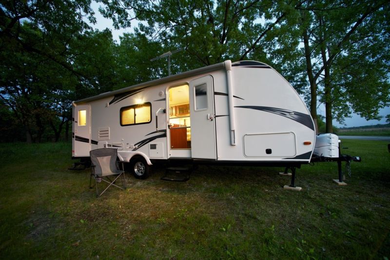 RV insurance - Modern RV camping in the forest